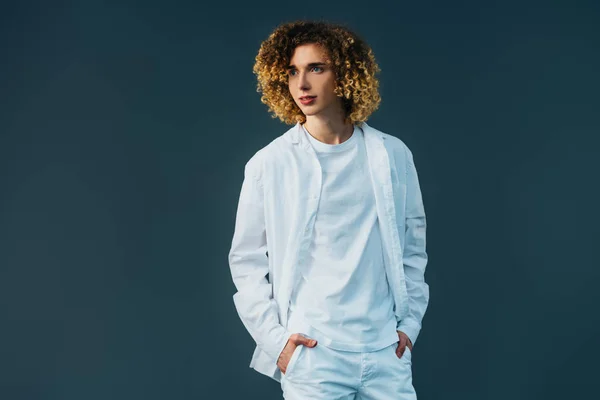 Curly Teenager Total White Outfit Hands Pockets Looking Away Isolated — Stock Photo, Image