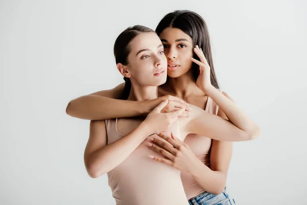 Beautiful Young Multicultural Girls Beige Outfit Tenderly Touching Each Other — Stock Photo, Image