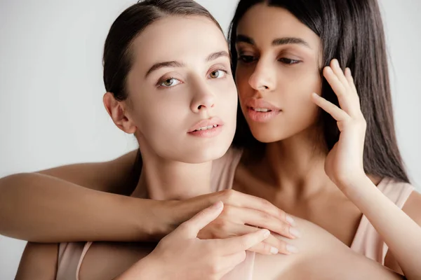 Young Multicultural Girls Beige Outfit Tenderly Touching Each Other Isolated — Stock Photo, Image