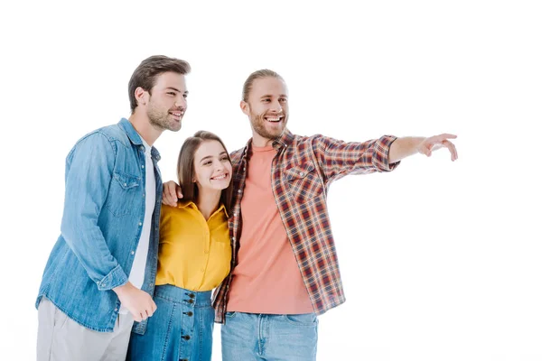 Три Молодих Друзі Вказують Пальцем Геть Ізольовані Білому — стокове фото