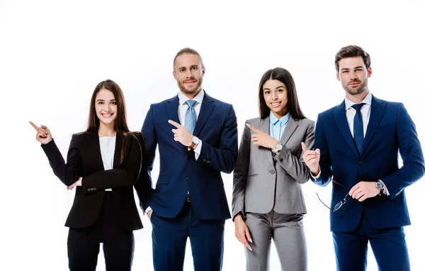 Sonriente Gente Negocios Multicultural Trajes Señalando Con Los Dedos Lado — Foto de Stock