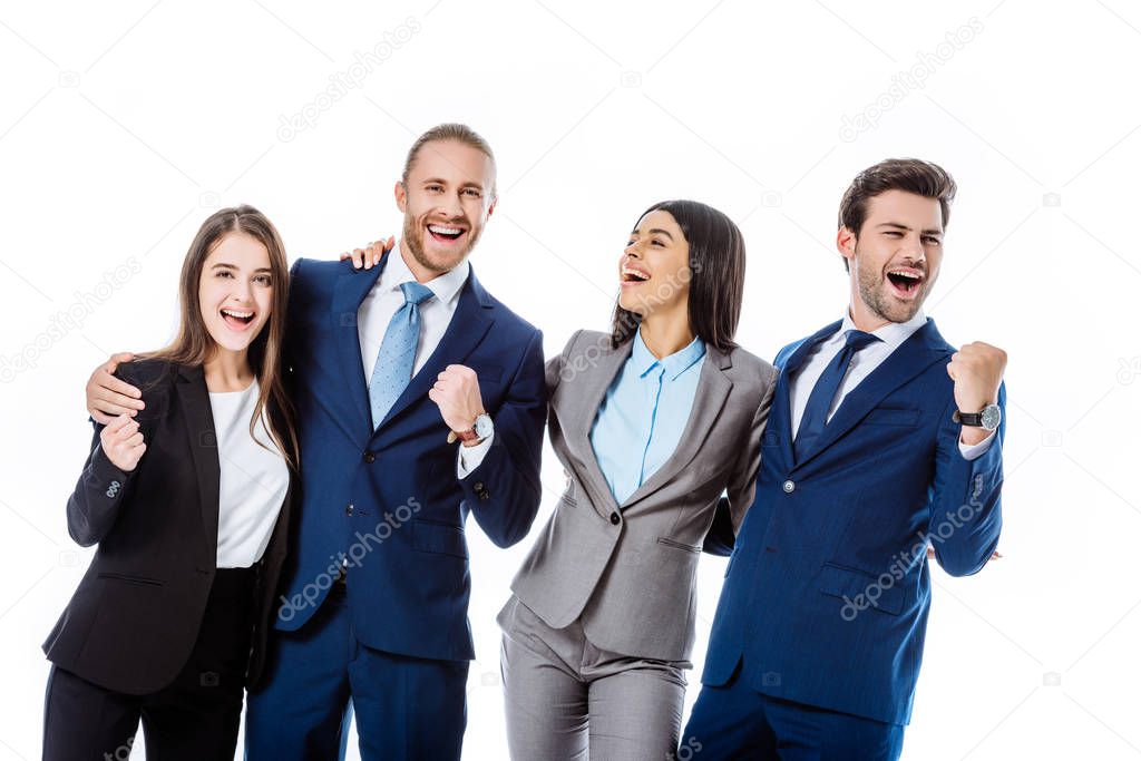 happy multicultural business people in suits laughing and showing yes gestures isolated on white