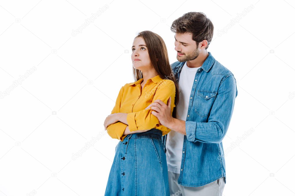 boyfriend calming down offended girlfriend isolated on white