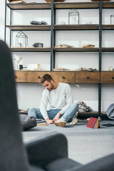 Selective Focus Handsome Sad Man Sitting Robbed Apartment — Stock Photo, Image