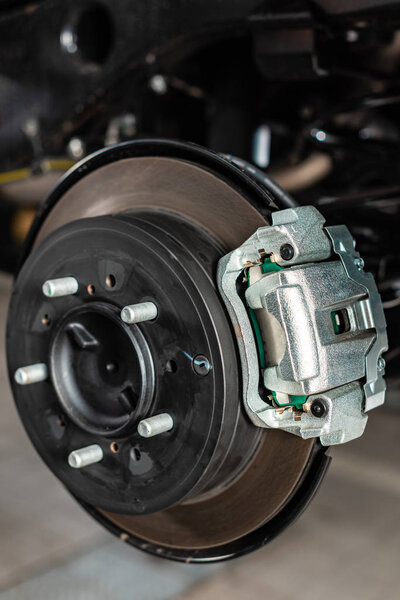 close up view of assembled disk brakes with brake caliper 