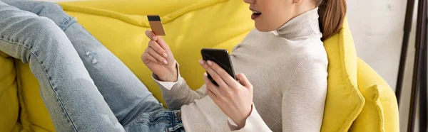 Cropped View Woman Holding Credit Card Smartphone Sofa — Stock Photo, Image