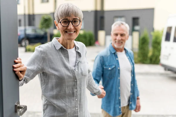 Selective Focus Smiling Woman Holding Hands Man Entering New House — Stock Photo, Image