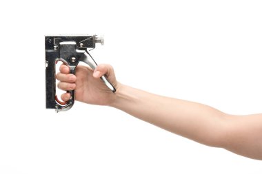 İnşaat zımbası tutan kadının beyaza izole edilmiş görüntüsü. 