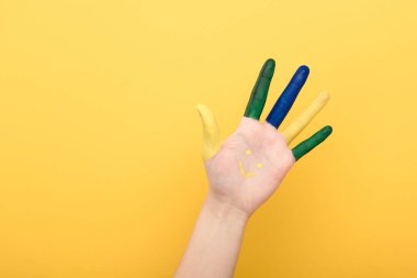 cropped view of woman showing colorful five fingers isolated on yellow  clipart