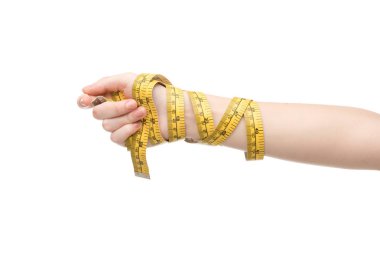 cropped view of woman holding measuring tape isolated on white clipart