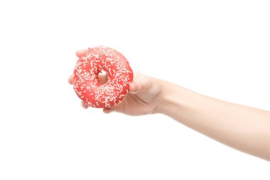 Beyaz üzerinde izole edilmiş donut tutan kadın manzarası