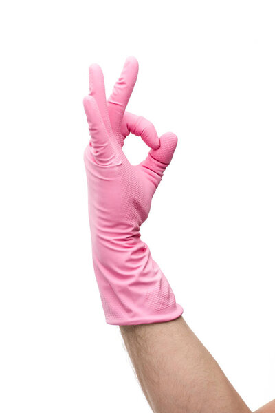 cropped view of man in rubber glove showing ok gesture isolated on white 