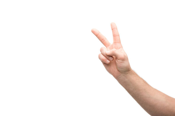 cropped view of man showing peace sign isolated on white