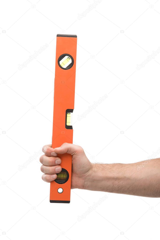 cropped view of man holding spirit level isolated on white