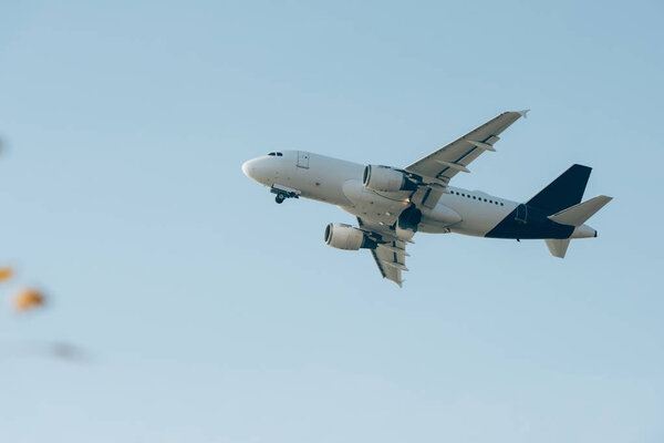 Low angle view of plane in clear sky 