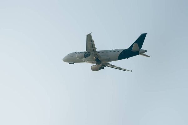 Low angle view of airplane with clear sky at background