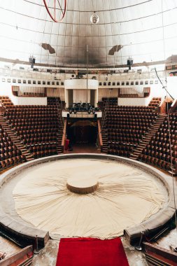 Empty circus arena with amphitheater and entrance clipart