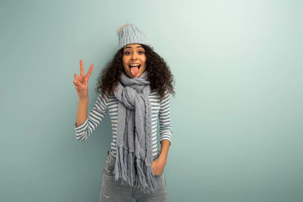 Cheerful Racial Girl Warm Hat Scarf Sticking Out Tongue Showing — Stock Photo, Image