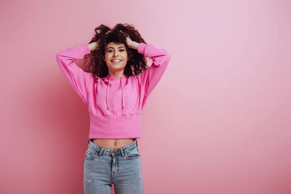 Happy Mixed Race Girl Looking Camera While Touching Hair Pink — Stock Photo, Image