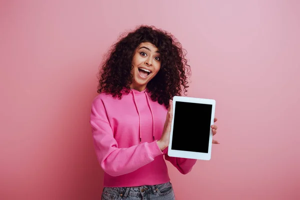 Excited Racial Girl Showing Digital Tablet Blank Screen Pink Background — 스톡 사진