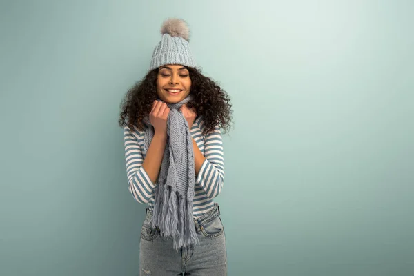 Pretty Racial Girl Warm Hat Scarf Smiling Closed Eyes Grey — Stock Photo, Image