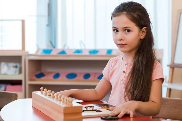 Child Folding Educational Game Looking Camera Desk Montessori School — 스톡 사진