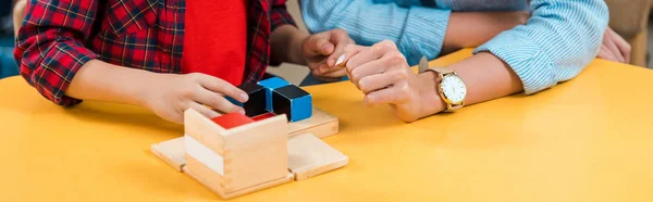 Cropped View Teacher Kid Playing Building Blocks Desk Montessori Class — Stock Photo, Image