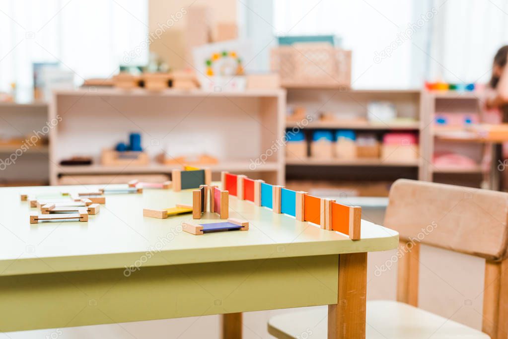 Selective focus of educational game on table in montessori school