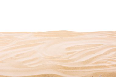 Textured sand on white background with copy space clipart
