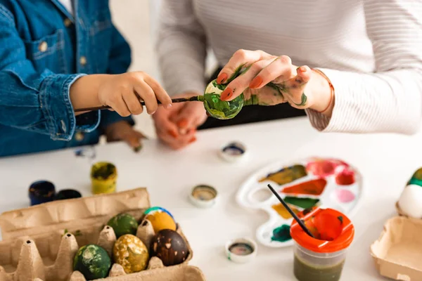 Cropped View Mother Son Sitting Table Painting Easter Eggs — Stock Photo, Image