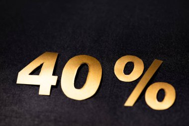 golden 40 percent signs on black background clipart