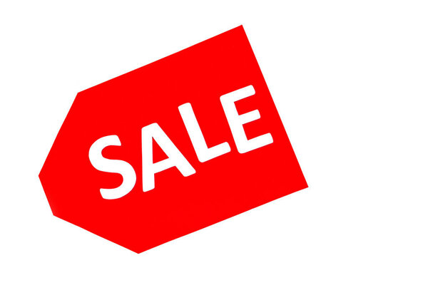 top view of red price tag with sale lettering isolated on white
