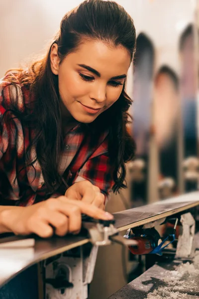 Smiling Attractive Worker Repairing Ski Repair Shop — Stock Photo, Image