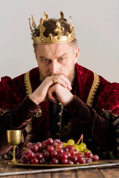 Thoughtful King Crown Sitting Table Isolated Grey — Stock Photo, Image