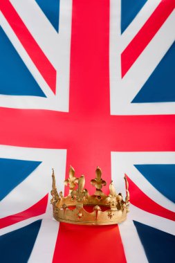 golden crown on british flag with copy space 