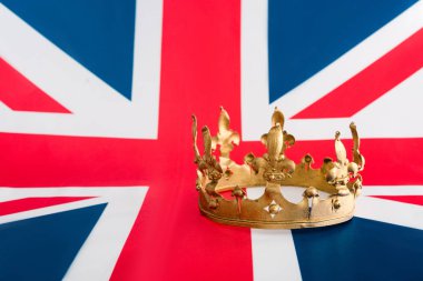 golden crown on british flag with copy space