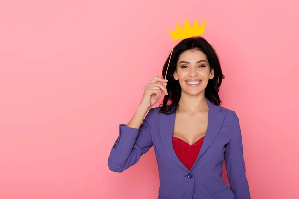 Smiling Woman Holding Paper Crown Pink Background — 스톡 사진