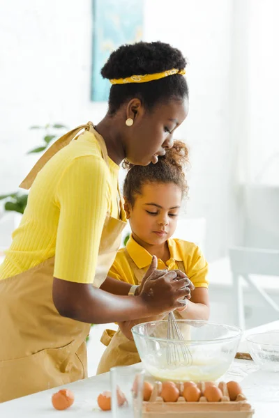 Selective Focus African American Mother Looking Bowl Daughter — Stock Photo, Image