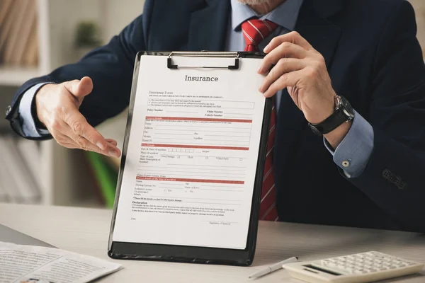 Cropped View Agent Pointing Hand Clipboard Insurance Lettering — Stock Photo, Image