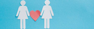 panoramic shot of paper cut figures of homosexual couple with heart isolated on blue, sexual equality concept  clipart