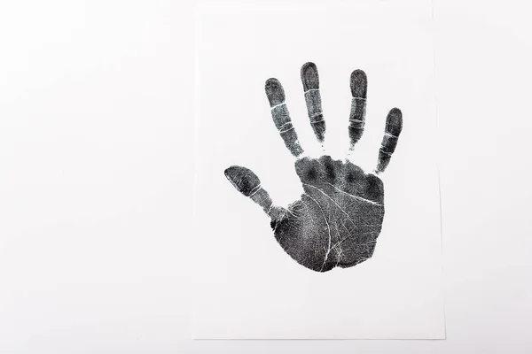 白地に隔離された黒い手のプリントの上から見た人間の権利の概念 — ストック写真