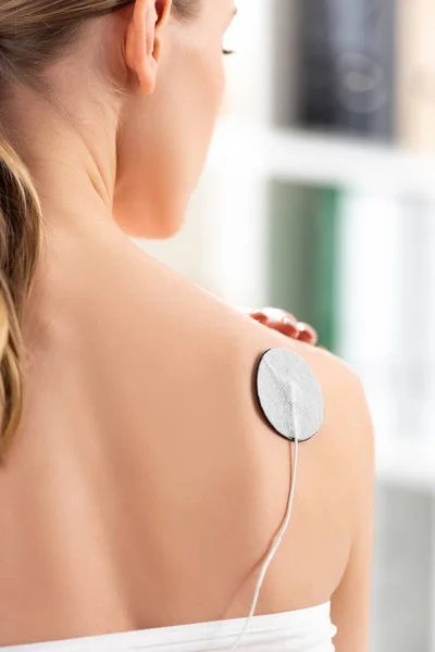 Back View Woman Electrode Shoulder Electrode Treatment — 스톡 사진