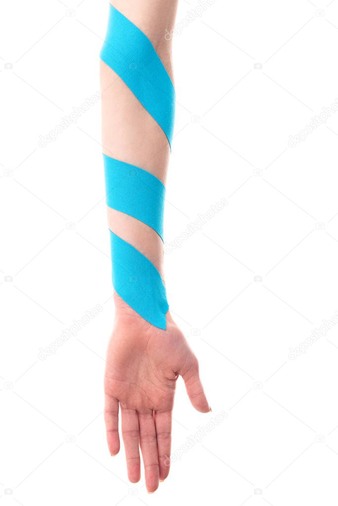 Cropped view of female hand with kinesiology tapes isolated on white