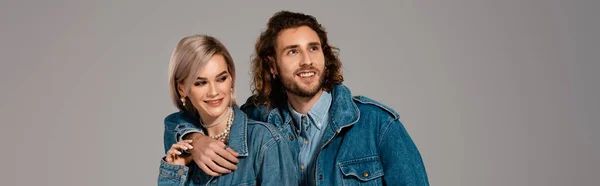 Panoramic Shot Smiling Man Hugging Woman Denim Jacket Isolated Grey — Stock Photo, Image