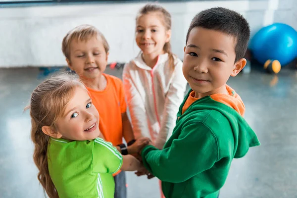 Selective Focus Multicultural Children Standing Together Circle United Hands Gym — Stock Photo, Image