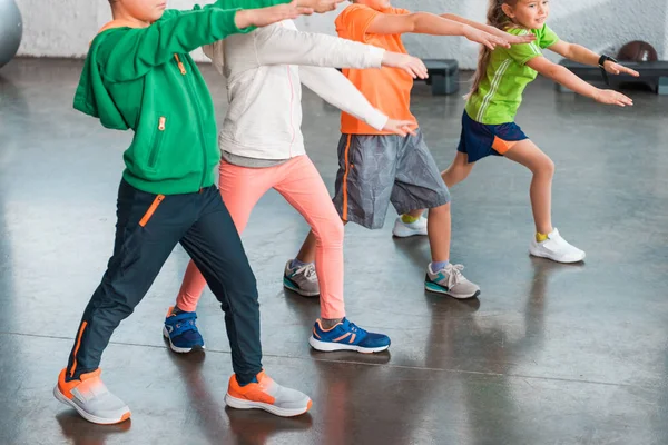 Cropped View Children Outstretched Hands Doing Lunges Gym — Stock Photo, Image