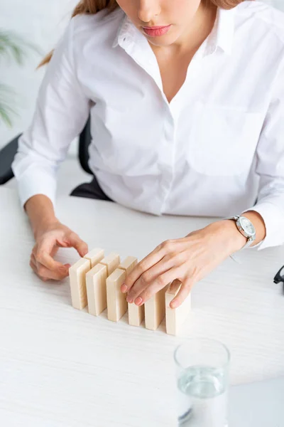 Cropped View Businesswoman Stacking Wooden Building Blocks Table — ストック写真