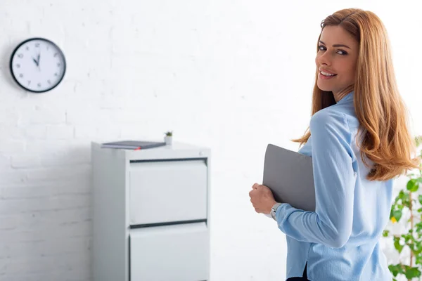 Smiling Businesswoman Paper Folder Looking Camera Office — Stockfoto