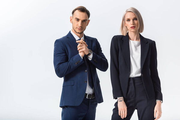 successful young tattooed businessman and businesswoman isolated on white