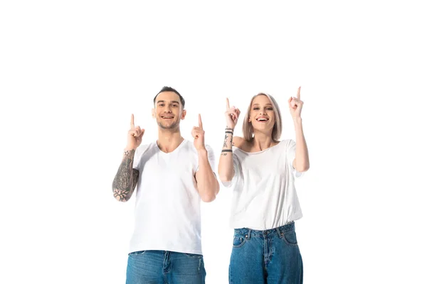 Happy Young Tattooed Couple Pointing Fingers Upwards Isolated White — Stock Photo, Image